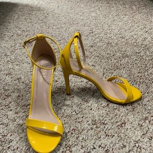 Women’s yellow 2 strap 4-inch heels.  Never worn